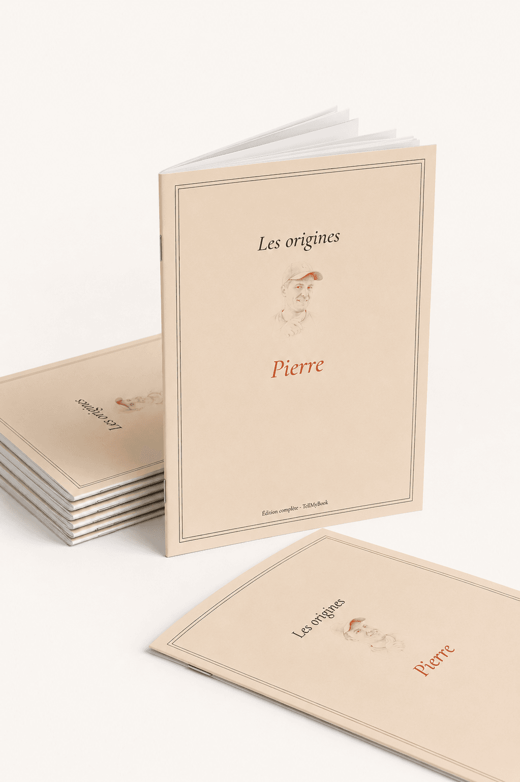 Le livre « Les origines », couverture crème avec portrait stylisé